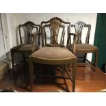 Seven mahogany Hepplewhite style dining chairs