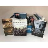 Four boxes containing a large quantity of hardback books,