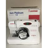 A boxed Janome Gem Platinum 760 sewing machine