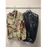 A full rail of various clothing, shirts, jackets,