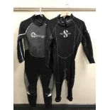 A part rail of wet suits, outdoor coats,