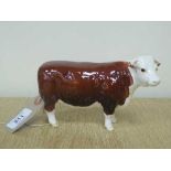 A Beswick figure - Hereford Cow, model 1360, gloss.