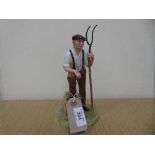 A Royal Doulton Classics figure - The Farmer HN 4487