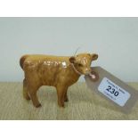 A Beswick figure - Highland Calf, model 1827D, gloss.