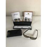 A tray containing a pair of Rayban sunglasses in case, silver bracelet,