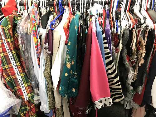 A full rail of dresses, pantomime outfits, - Image 2 of 2