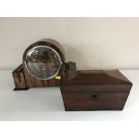 A walnut dome topped mantel clock together with a Victorian rosewood tea caddy