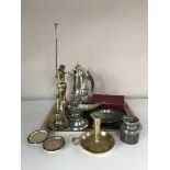 A plated teapot with burner on stand, Norwegian pewter candle holders, brass candlesticks,