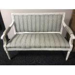 A white painted two seater salon settee
