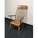 A Victorian elm rocking chair