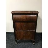 A mahogany three drawer chest