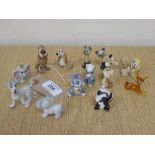 A collection of Wade and other animal whimsie figures, Disney etc.