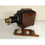 A vintage wooden cased Magic Lantern