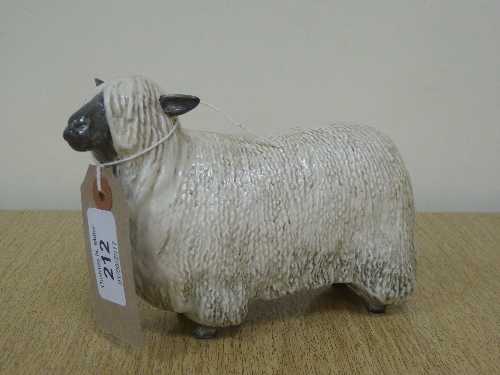 A Beswick figure - Wensleydale Sheep, model 4123, white/black.