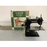 A miniature Singer sewhandy sewing machine No.