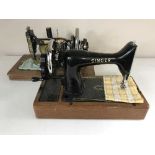 A Royal hand sewing machine and a Singer sewing machine