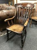 A Victorian elm rocking chair