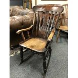 A Victorian elm rocking chair