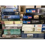 Eighteen boxed jigsaws