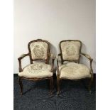 A pair of walnut armchairs