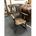 A Victorian elm rocking chair
