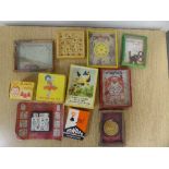 A box of vintage games and puzzles, playing cards etc,