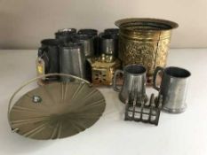 A tray of brass planters, candlestick, egg timer, pewter pieces,