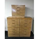 A pair of melamine six drawer chests and bedside chests