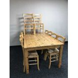 Large pine kitchen table and ten dining chairs