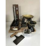 A tray of Viking kitchen scales with weights, boxed Dr pressure cuff, metal money box throne,