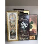 A box of pictures and wooden plaques