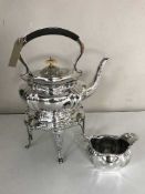 A silver plated spirit kettle on stand and a milk jug (2)