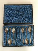 A set of six cased silver teaspoons,