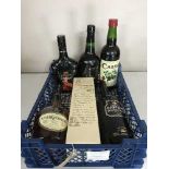 A box of six bottles of alcohol - 75cl bottle of Courvoisier Cognac, Arran 70cl whiskey, sherry,