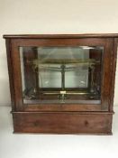 A mahogany cased set of scales stamped Knowles Patent Yarn Balance, Goodbrand & Co.