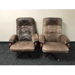 A pair of beech framed and brown leather armchairs