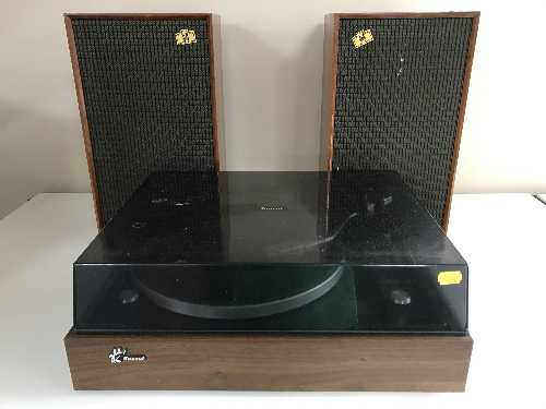 A Sansui Sr-212 turn table with instructions and a pair of Castle Acoustic speakers