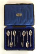 A set of six cased silver teaspoons and sugar tongs, Sheffield marks,