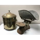 An antique set of weighing scales together with a brass coal receiver containing coal