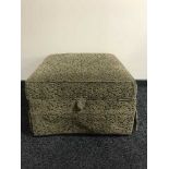 Upholstered ottoman footstool