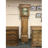 A continental oak eight-day longcase clock, with brass dial.