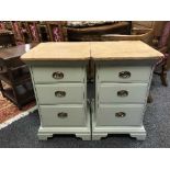 A pair of painted pine bedside chest of three drawers,
