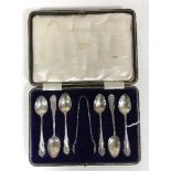 A cased set of six silver teaspoons with tongs