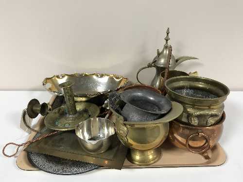 A tray of brass and copper ware, embossed copper plaque, candle snuffer, brass planters,