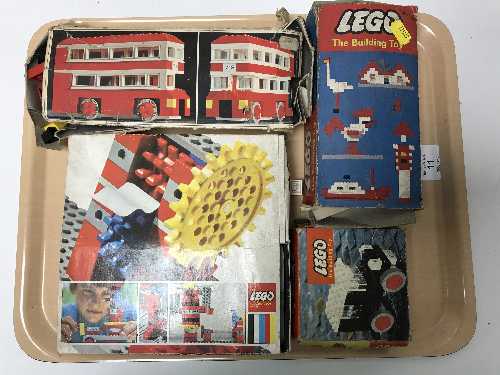 Four boxed vintage Lego sets