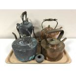 Four antique copper kettles