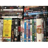 A box of assorted DVDs