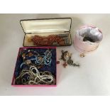 Four boxes of costume jewellery, necklaces, earrings,