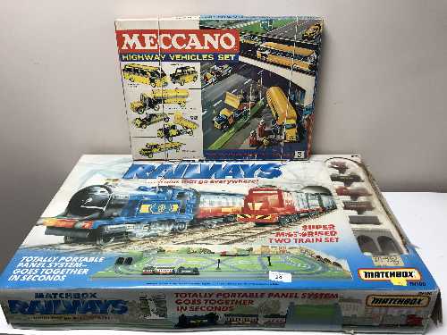 A boxed Matchbox train set and a boxed Meccano Highway vehicles set