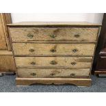 A 19th Century continental inlaid oak chest of four drawers,